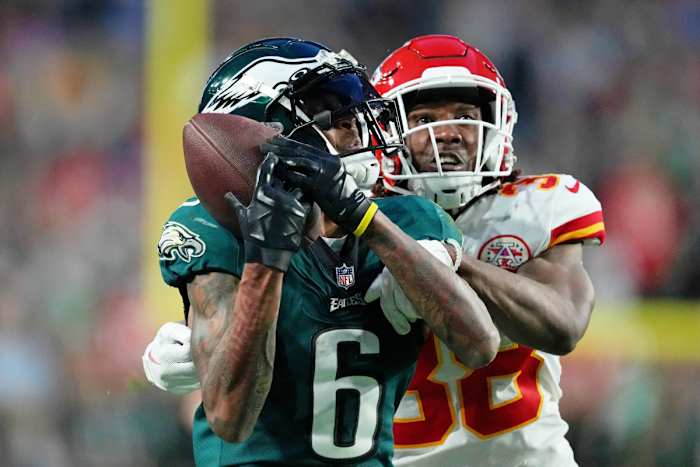 Feb 12, 2023; Glendale, Arizona, US; Philadelphia Eagles wide receiver DeVonta Smith (6) is unable to make a catch against Kansas City Chiefs cornerback L'Jarius Sneed (38) during the second quarter of Super Bowl LVII at State Farm Stadium.